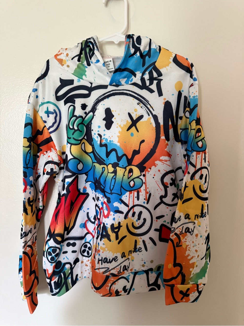 SHEIN Blue, Black, Yellow Graffiti Hoodie. Pit to pit 18 NWOT